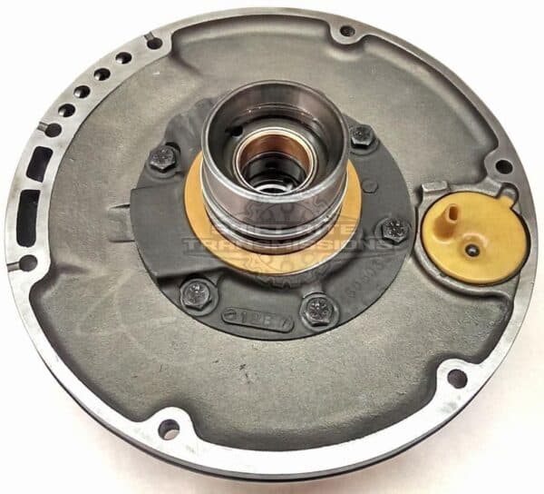 Automotive transmission pump assembly on white background.