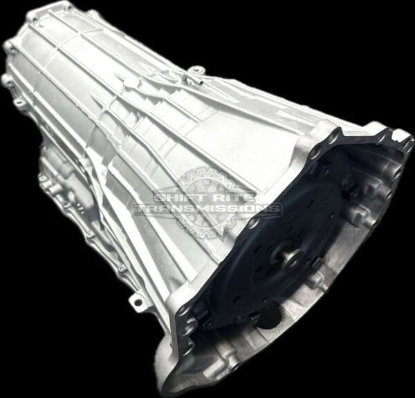 Silver car transmission on black background