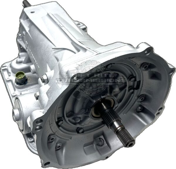 Silver automotive transmission shaft, side view.