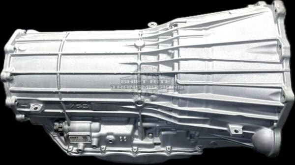 Silver automotive transmission on black background