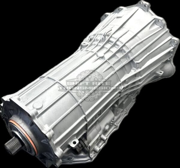 Silver automotive transmission on black background