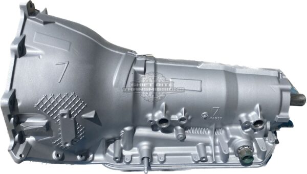 Automotive transmission component, silver, isolated view.