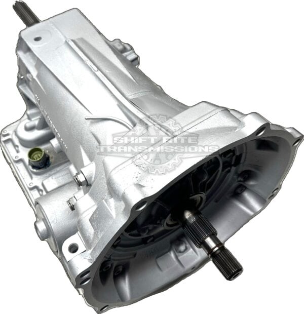Silver automatic car transmission unit close-up.